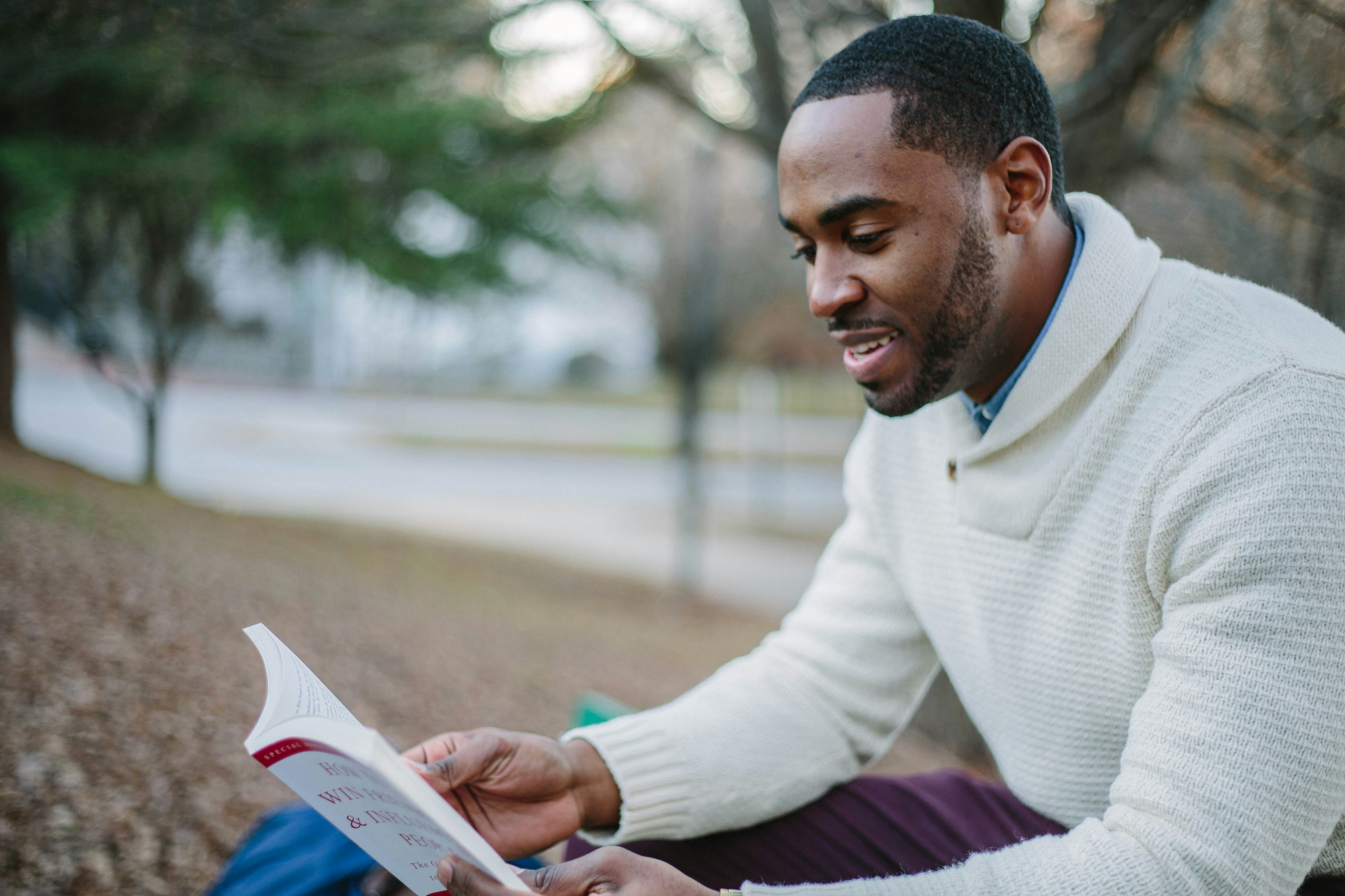 Men reading a book