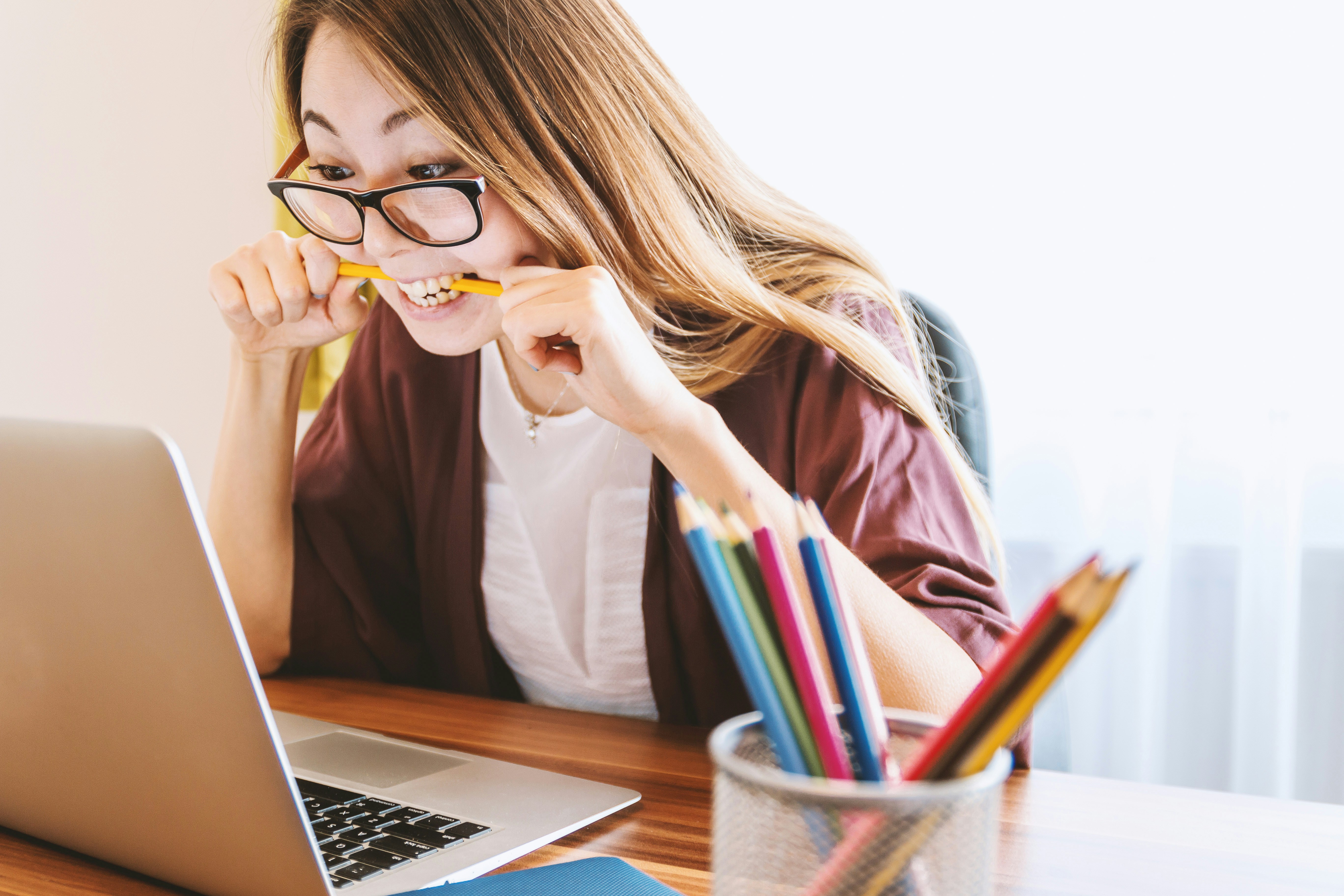 Student biting a pencil